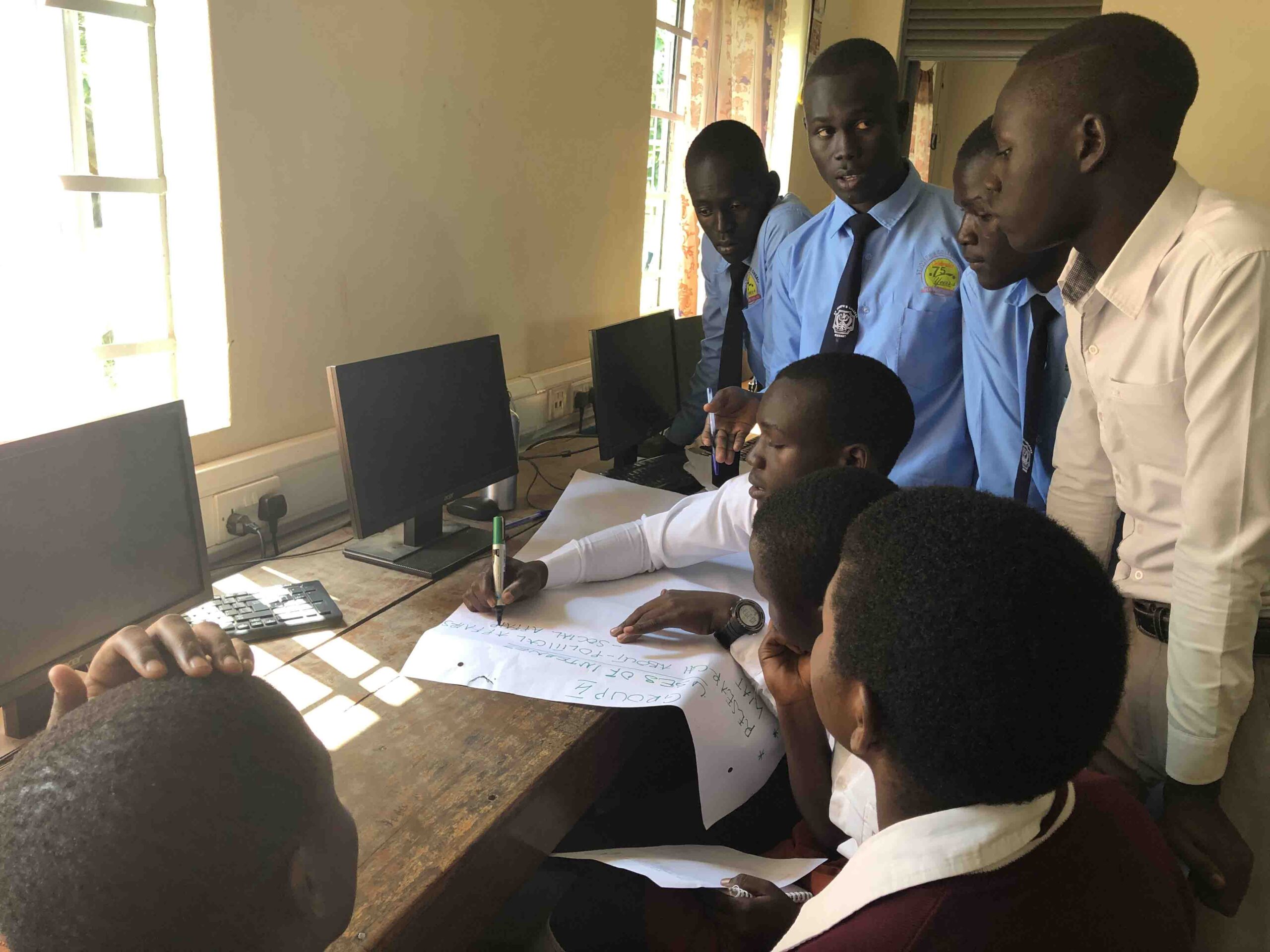 College students during a PED engagement in Northern Uganda.